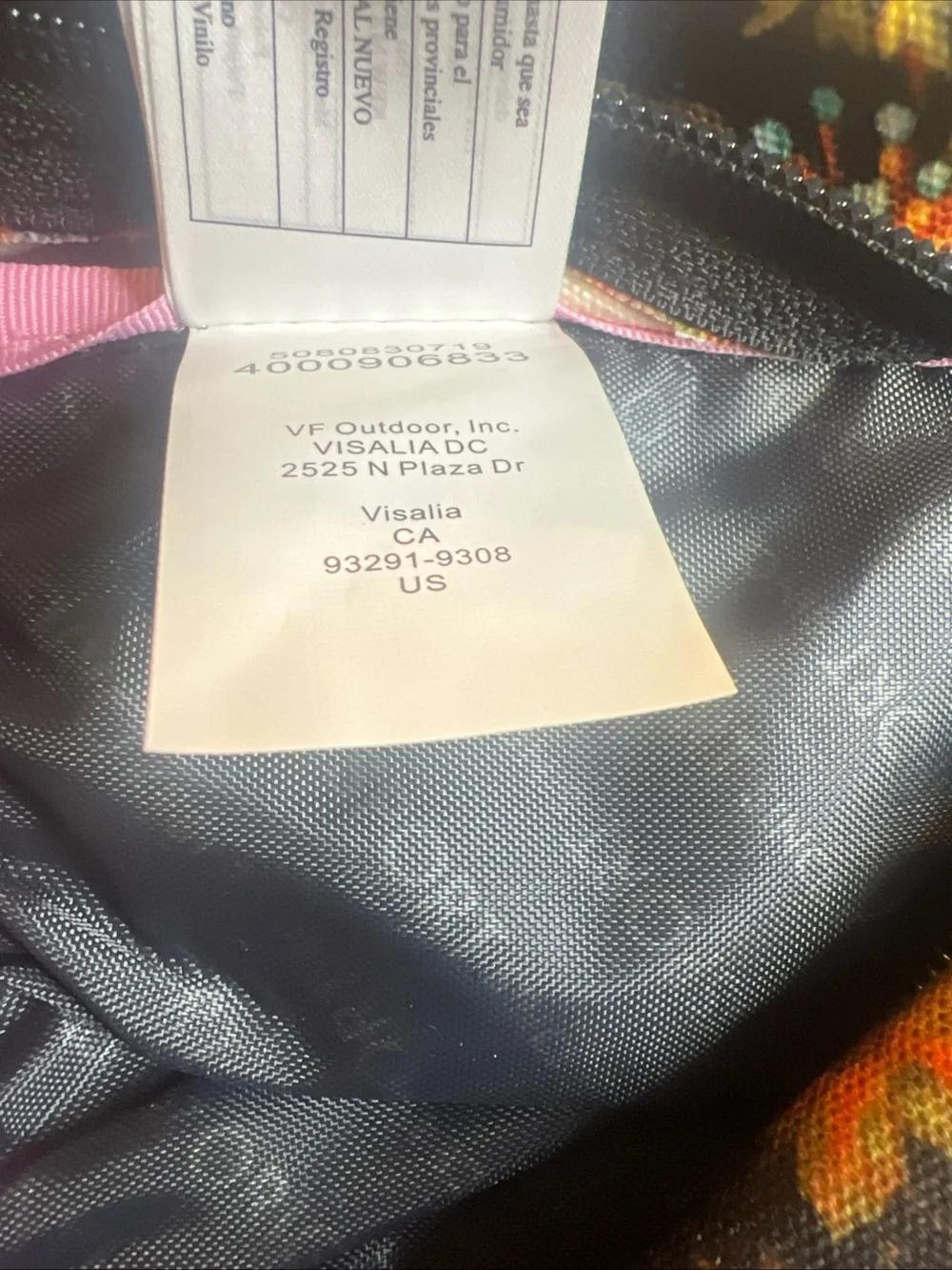 Jansport Black Floral Backpack with Pink and Orange Blooms